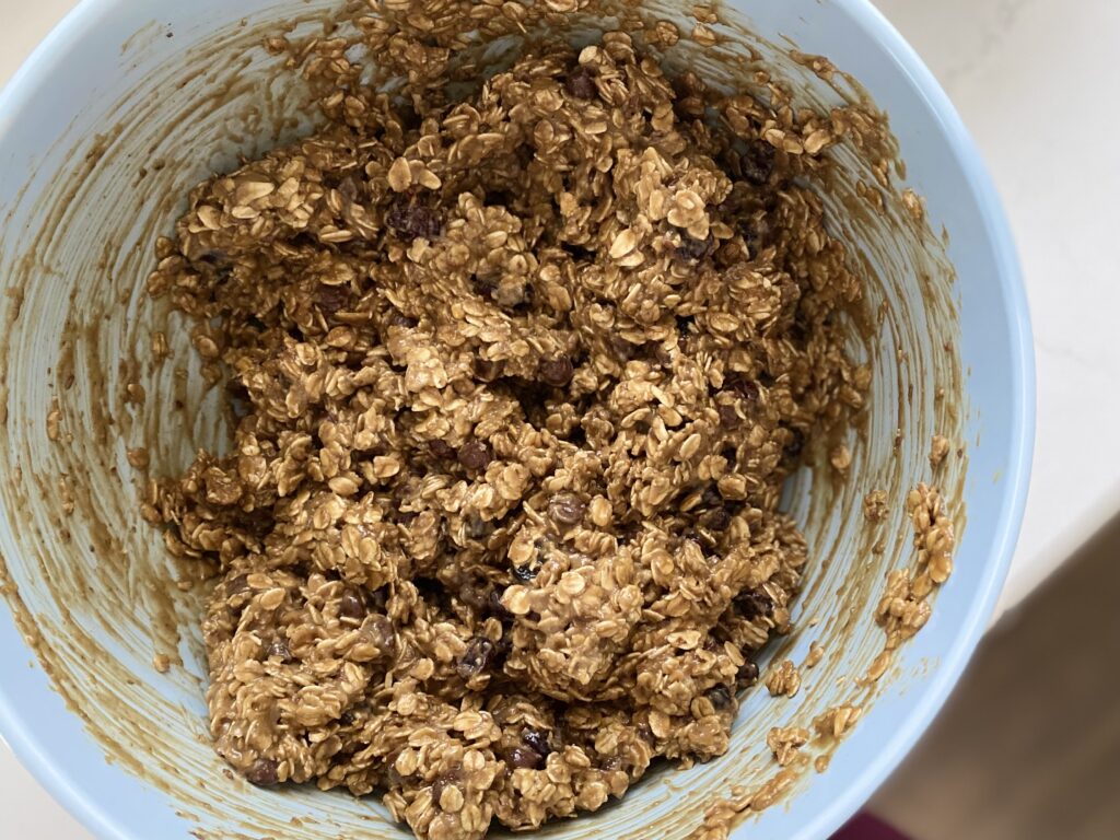 granola bar mixture in a blue bowl