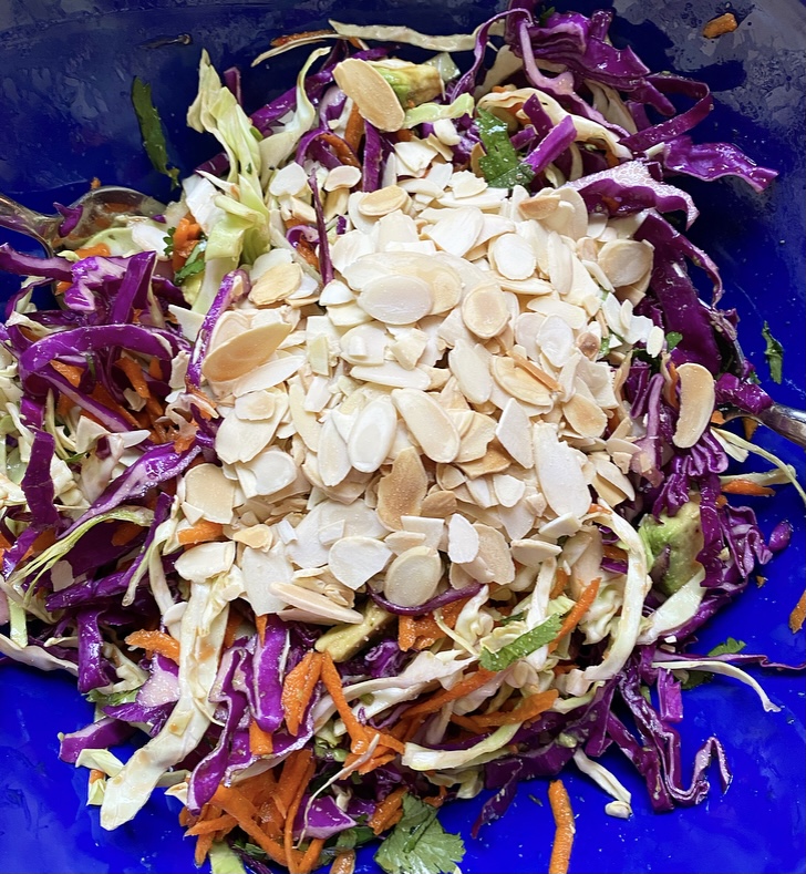asian spring salad ingredients with sliced almonds