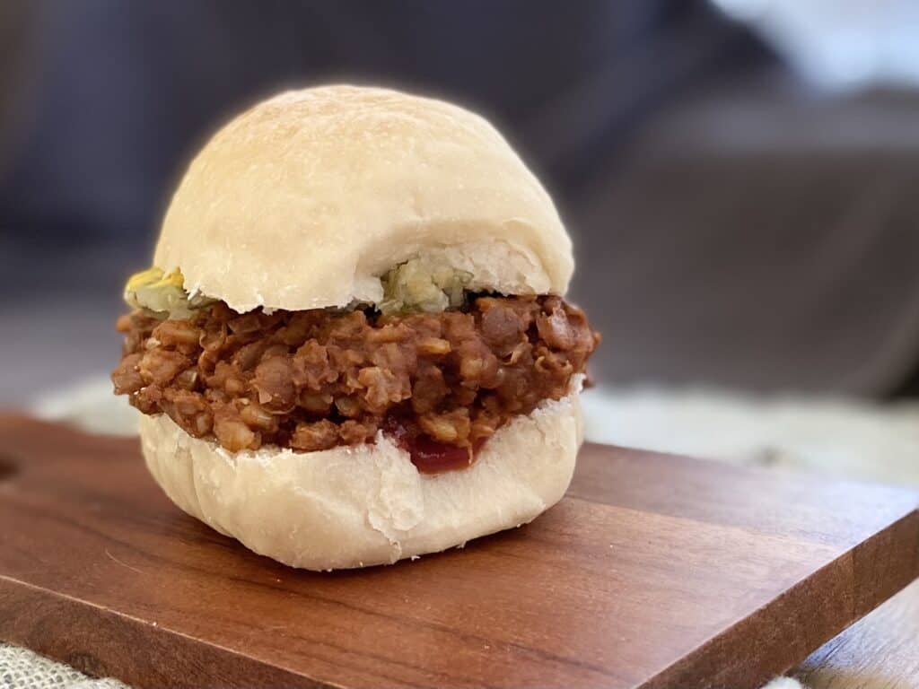 vegan sloppy joe on a sourdough dinner roll