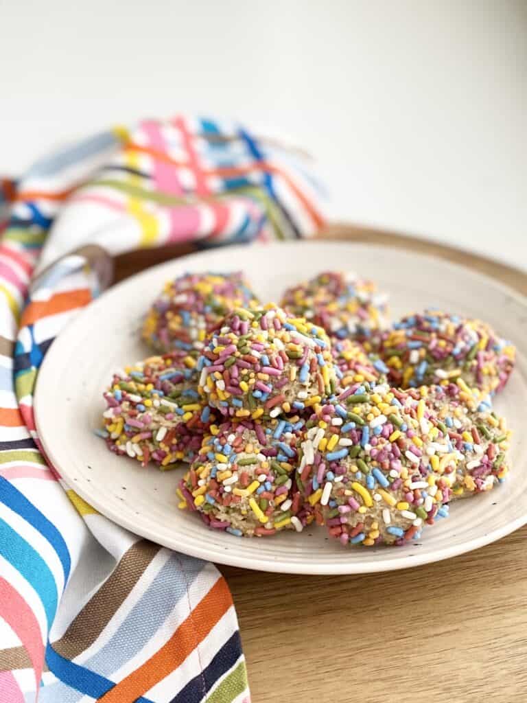 plate of rainbow sprinkle sugar cookies gluten free sugar cookies vegan sugar cookies