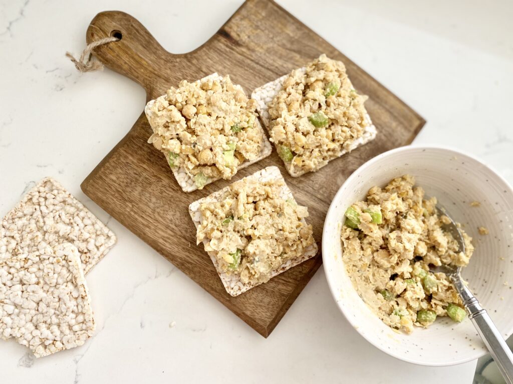 chickpea salad on brown rice crackers