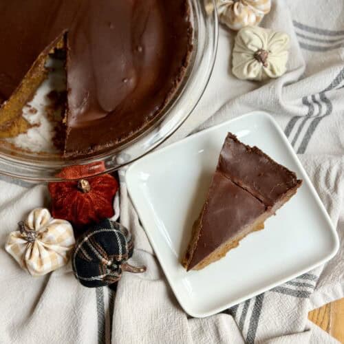 Aimee from Homemaker on a Budget elevates tradition with a rich chocolate ganache pumpkin pie.