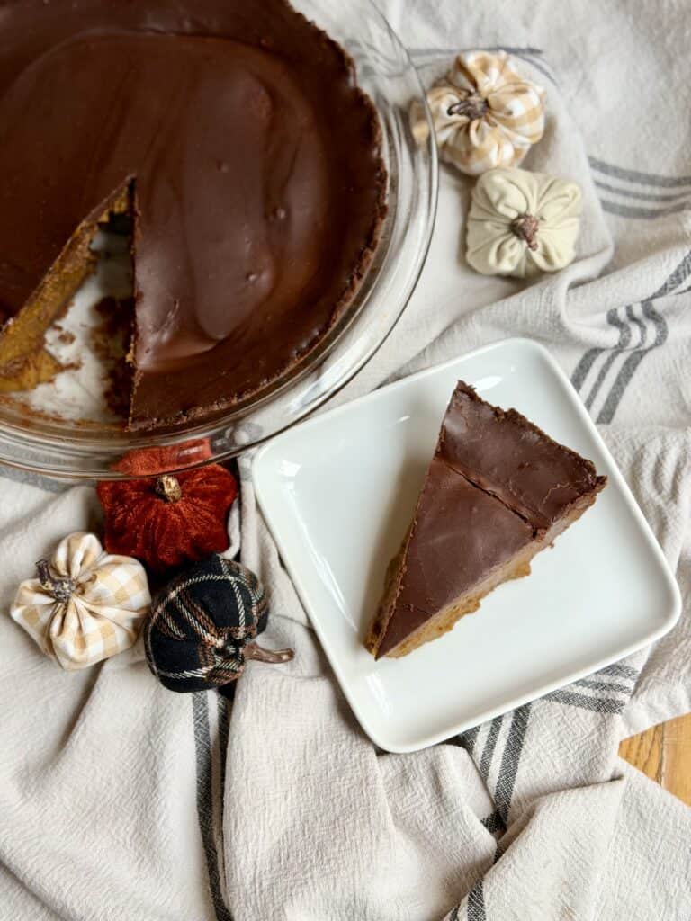 Aimee from Homemaker on a Budget elevates tradition with a rich chocolaty twist on pumpkin pie.