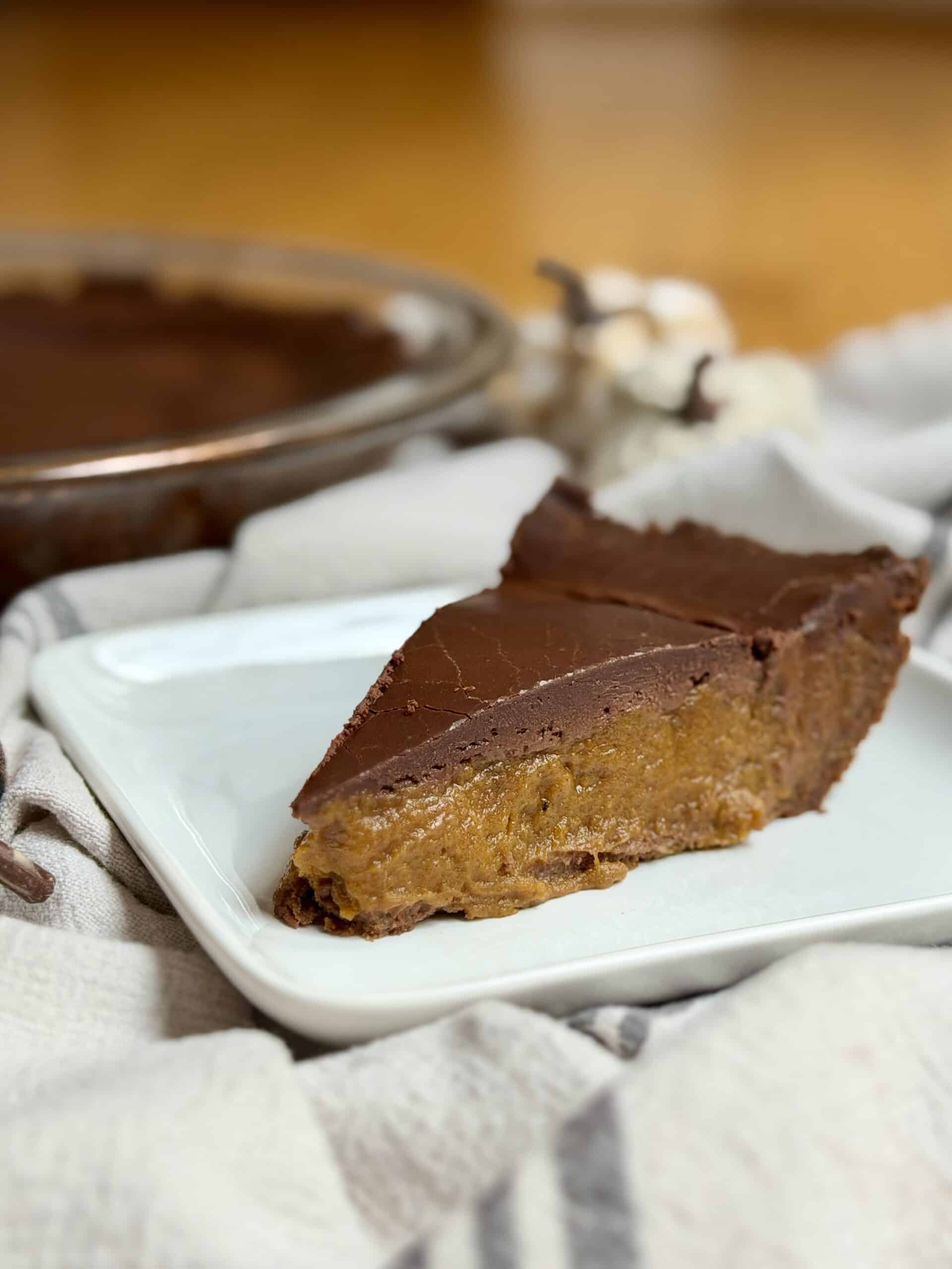 Aimee from Homemaker on a Budget elevates a Fall classic with a chocolaty twist in chocolate pumpkin pie.