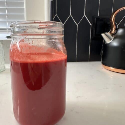 Aimee from Homemaker on a Budget blends apples, carrots, beets for maximum benefit juice!