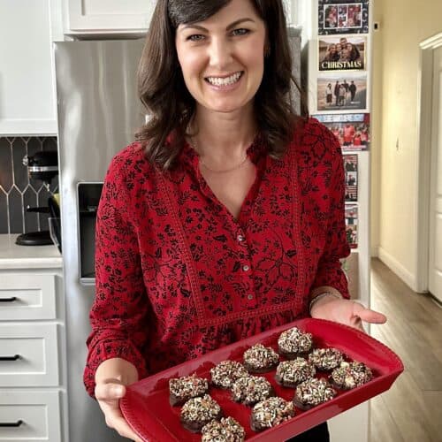 Aimee from Homemaker on a Budget presents chocolate dipped Nut Clusters with dark chocolate with nuts.