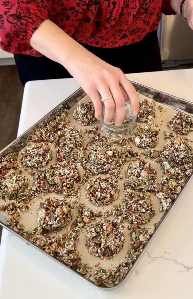 Aimee from Homemaker on a Budget makes chocolate dipped Nut Clusters.