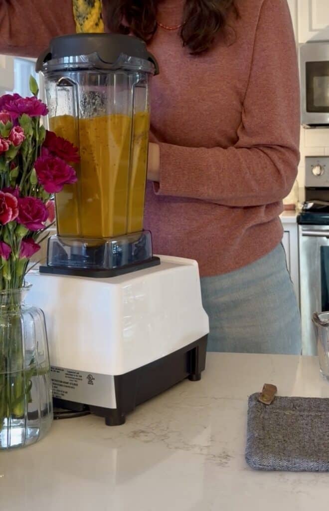 Aimee from Homemaker on a Budget uses her Vitamix blender to puree root vegetables for a healthy dinner.