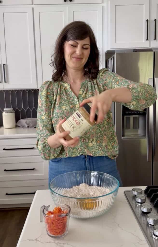 Aimee from Homemaker on a Budget prepares to make homemade carrot cake snack bars recipe.