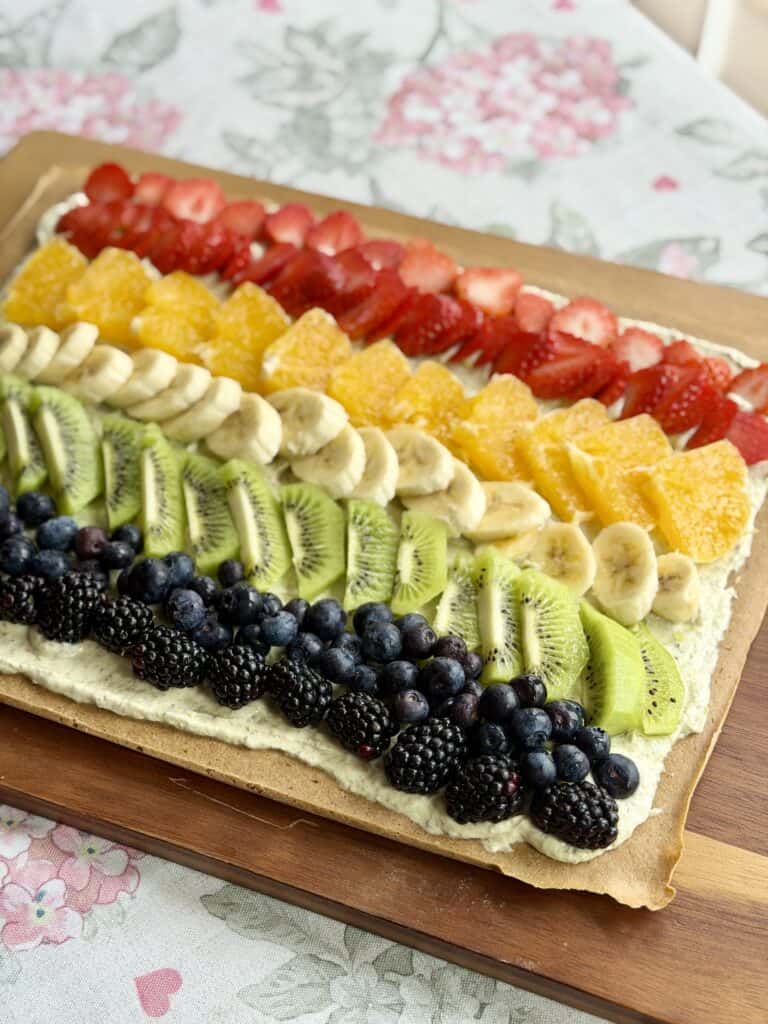 Aimee from Homemaker on a Budget serves a healthy breakfast fruit pizza that is gluten-free.