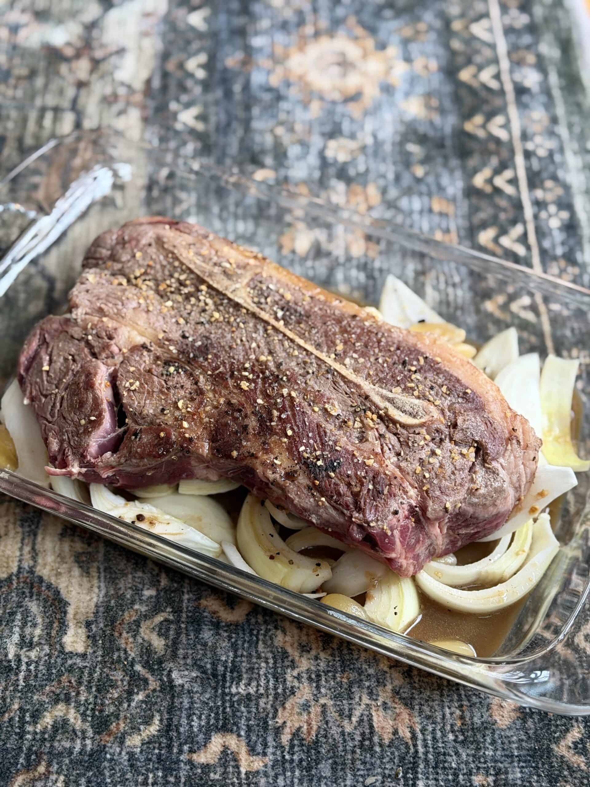 Aimee from Homemaker on a Budget prepares to bake grass-fed beef chuck roast in the oven with simple ingredients.