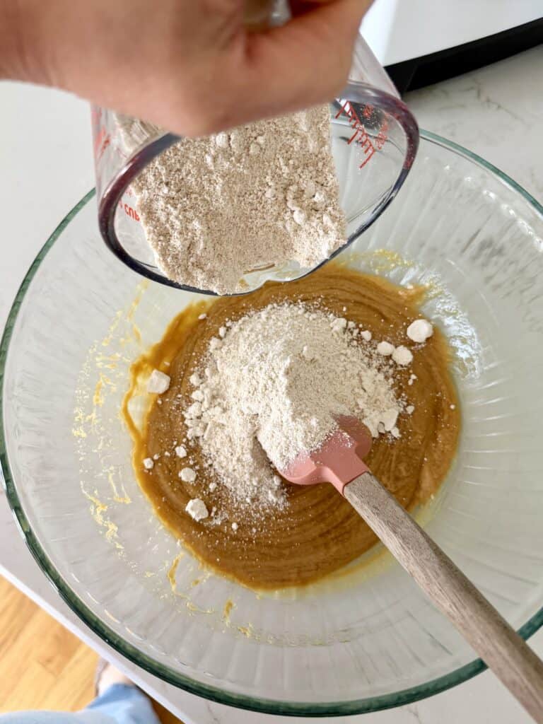 Aimee from Homemaker on a Budget adds gluten free flour to healthy no-bake buckeye bar recipe.
