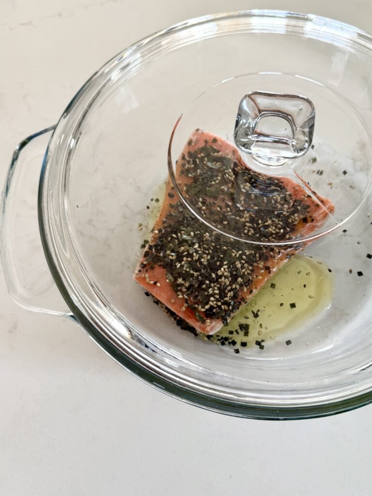 Aimee from Homemaker on a Budget bakes a frozen salmon fillet in the oven. 