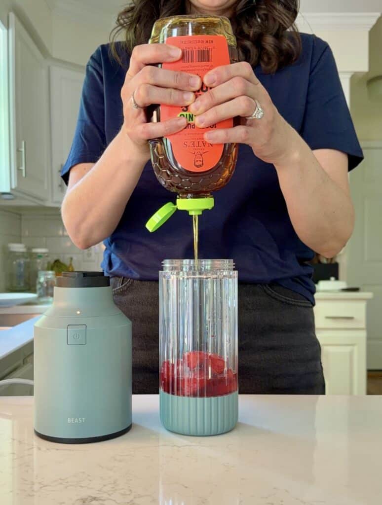 Aimee from Homemaker on a Budget adds honey to her simple strawberry syrup recipe.