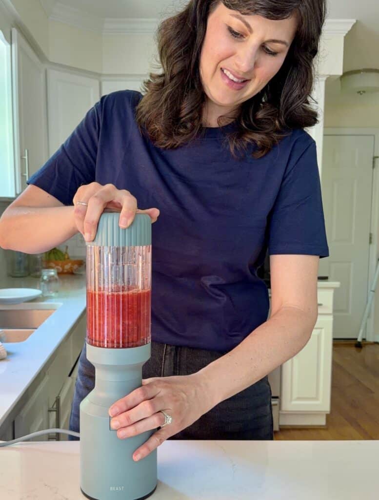 Aimee from Homemaker on a Budget blends two ingredients in simple strawberry syrup recipe