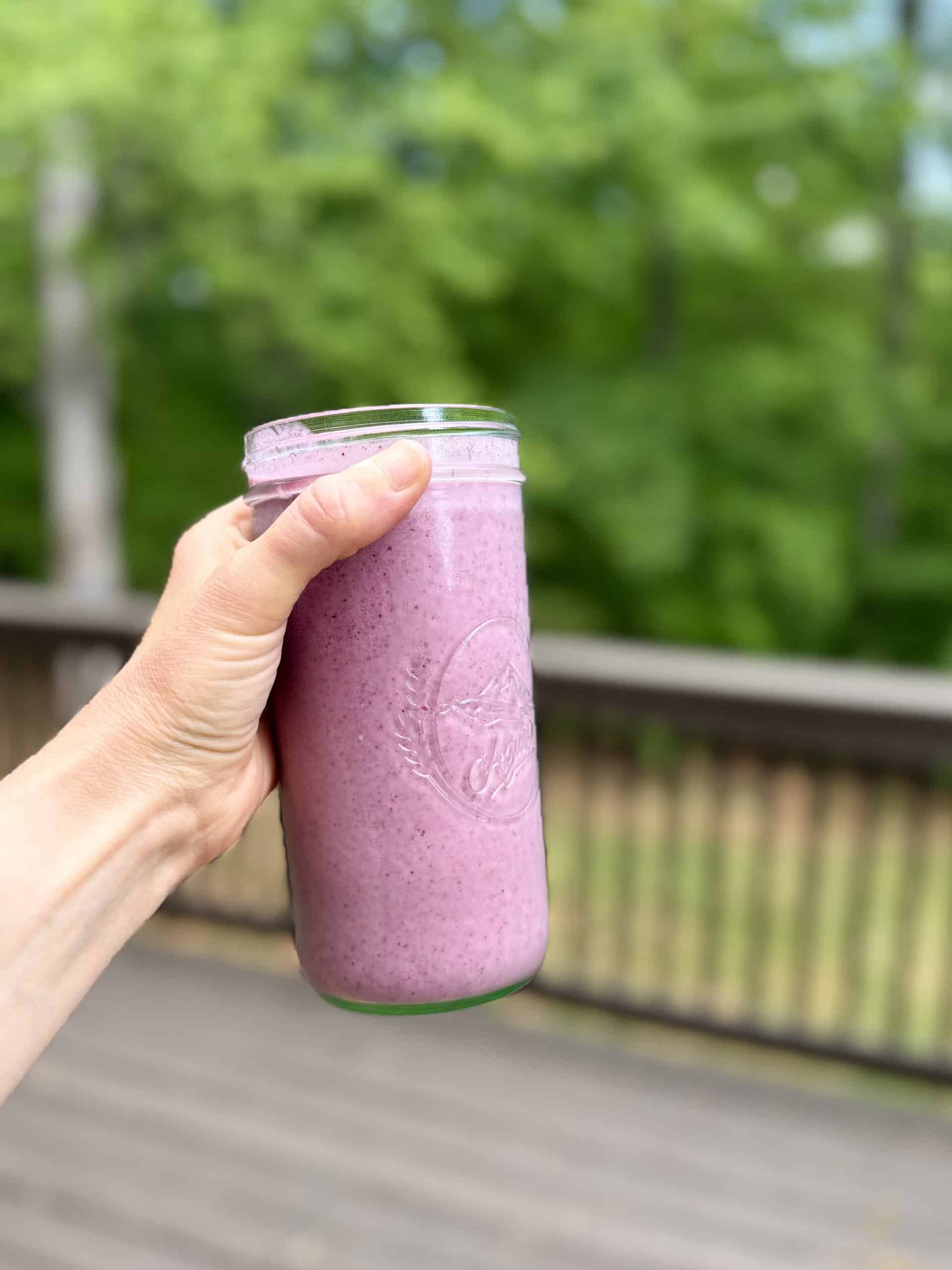 Aimee from Homemaker on a Budget enjoys a delicious anti-inflammatory blueberry strawberry smoothie for breakfast.