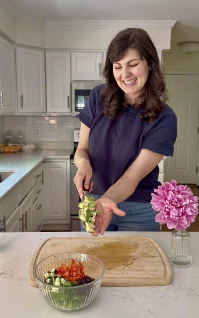 Aimee from Homemaker on a Budget shares her chopping tricks as she prepares a salad made with Pico de Gallo.