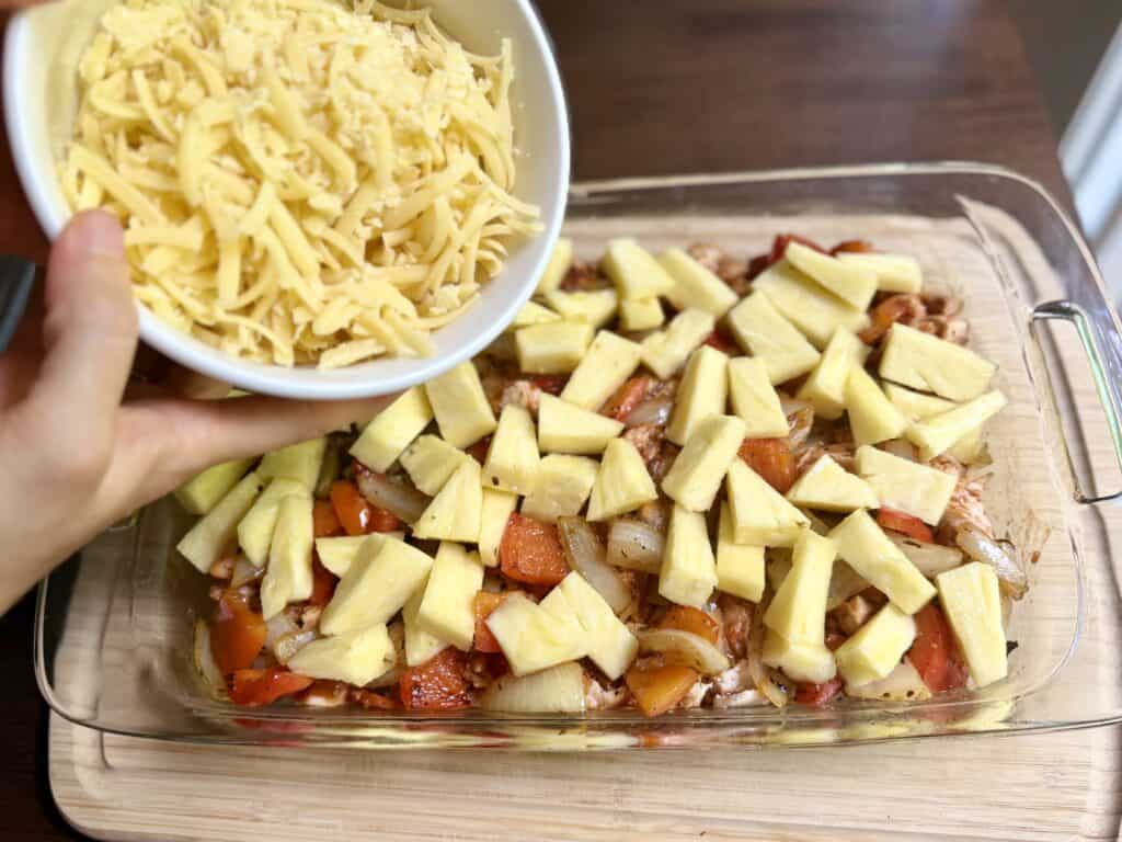Aimee from Homemaker on a Budget uses her favorite Kerrygold cheese to top Hawaiian Chicken Bake, chicken with pineapple. 