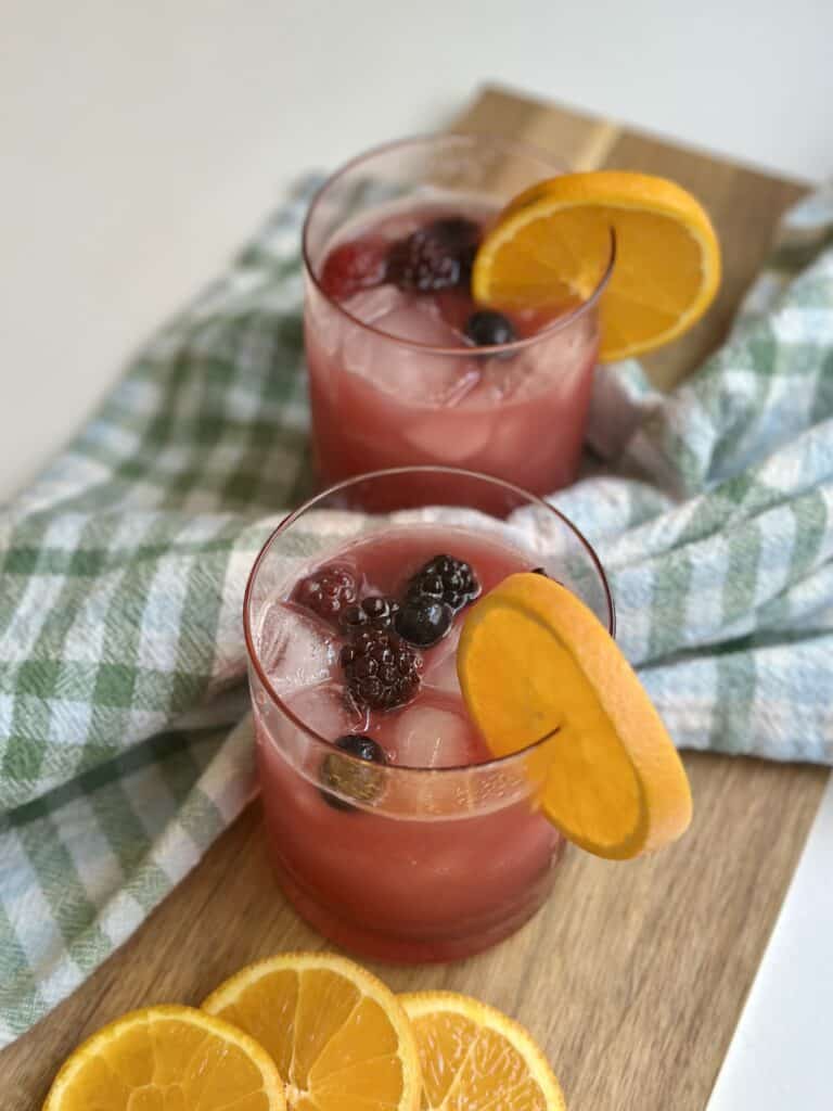 Aimee from Homemaker on a Budget spreads cheer serving a bright and refreshing cranberry punch.