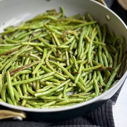 Aimee from Homemaker on a Budget serves a healthy side dish of easy green beans that are low carb.