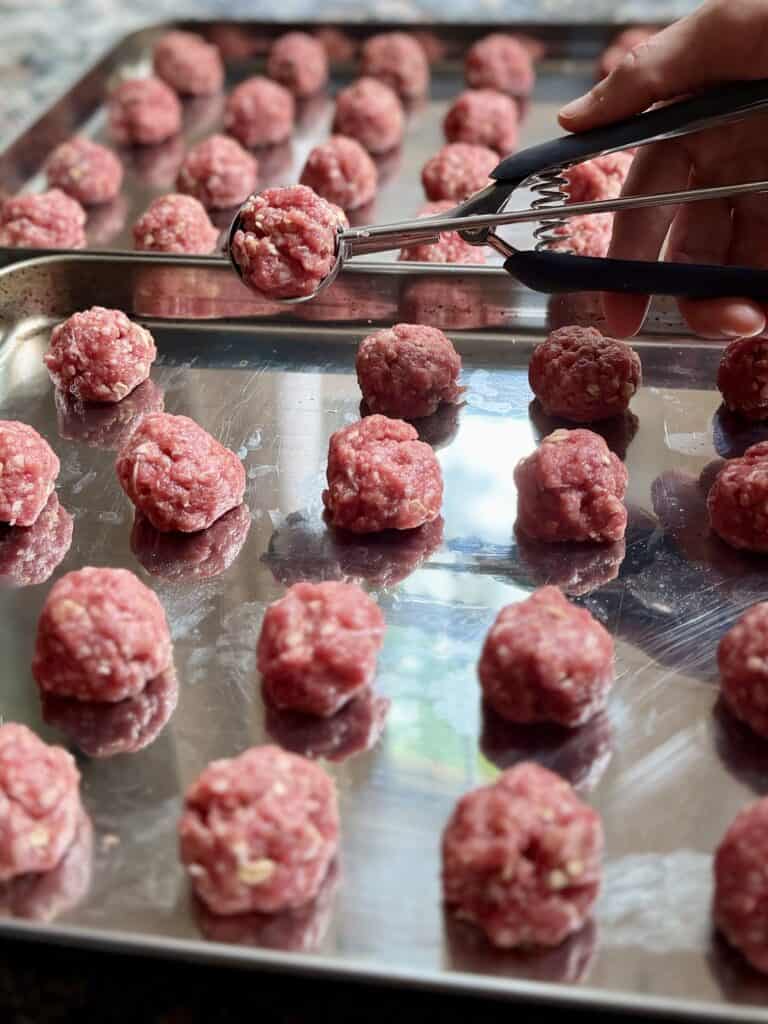 Aimee from Homemaker on a Budget bakes delicious homemade meatballs for dinner.