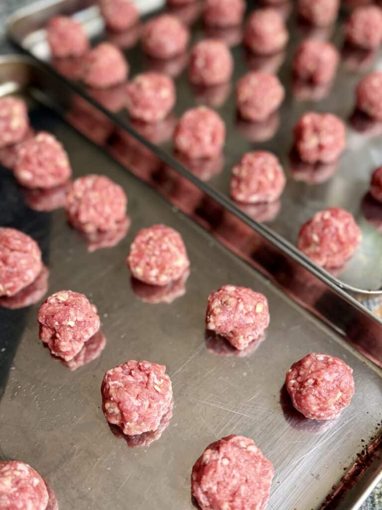 Aimee from Homemaker on a Budget prepares to bake batches of simple, gluten-free meatballs.