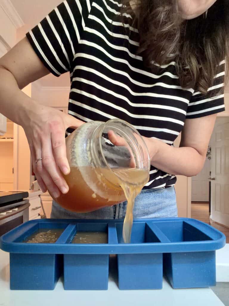 Using Souper cubes, Aimee from Homemaker on a Budget demonstrates how to use these storage containers to freeze beef marrow bone broth.