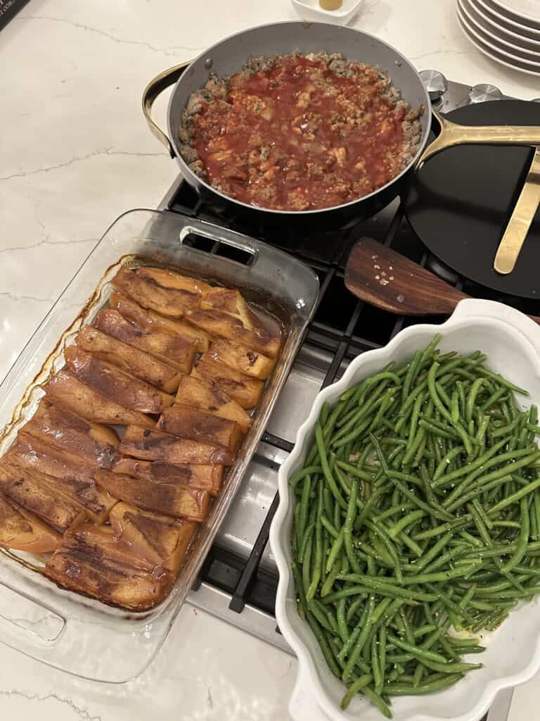 Aimee from Homemaker on a Budget serves easy low-carb green beans alongside many different meal main ideas.