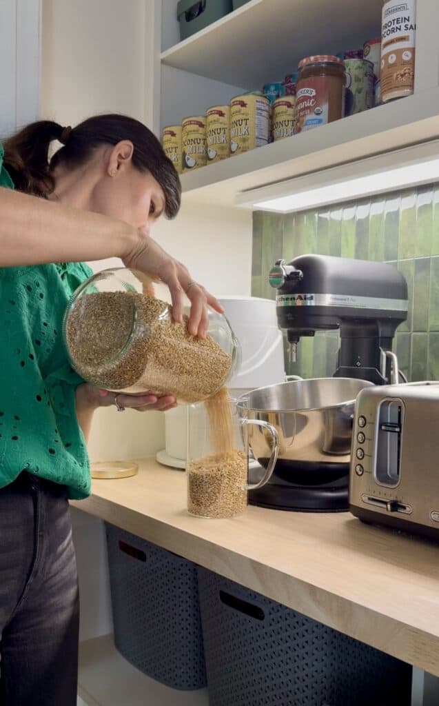 Aimee from Homemaker on a Budget shows us the steps to grinding her own wheat berries in a grain mill. 
