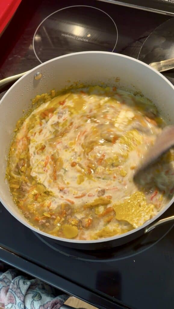 Adding in milk & seasonings, Aimee from Homemaker on a Budget gives this hamburger potato soup it's creamy texture. 
