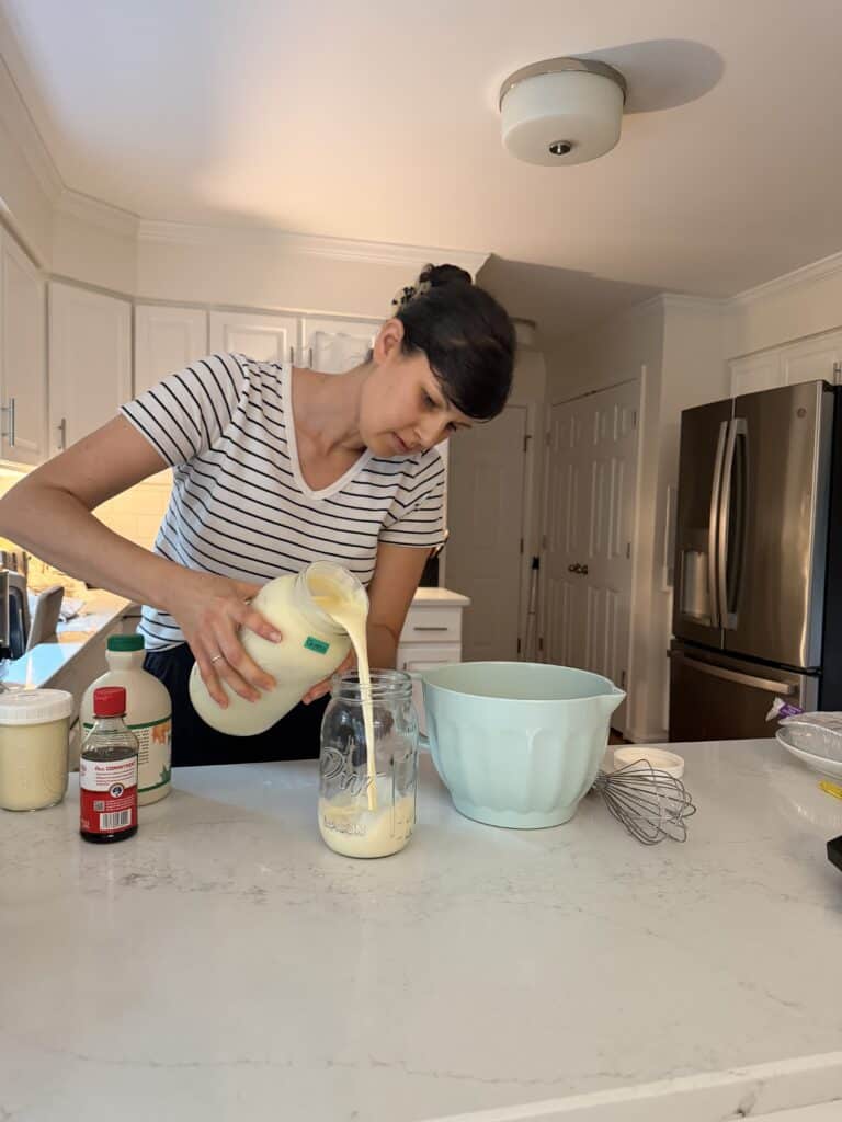 Aimee from Homemaker on a Budget uses raw, grass-fed milk to make a maple vanilla ice cream in a Cuisinart ice cream maker. 