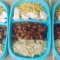 burrito bowl: rice, pinto beans, chicken, skillet corn, shredded cheese, salsa, sour cream